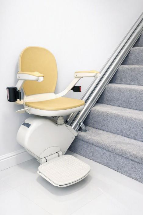 Acorn 130 Stair lift at the bottom of the staircase